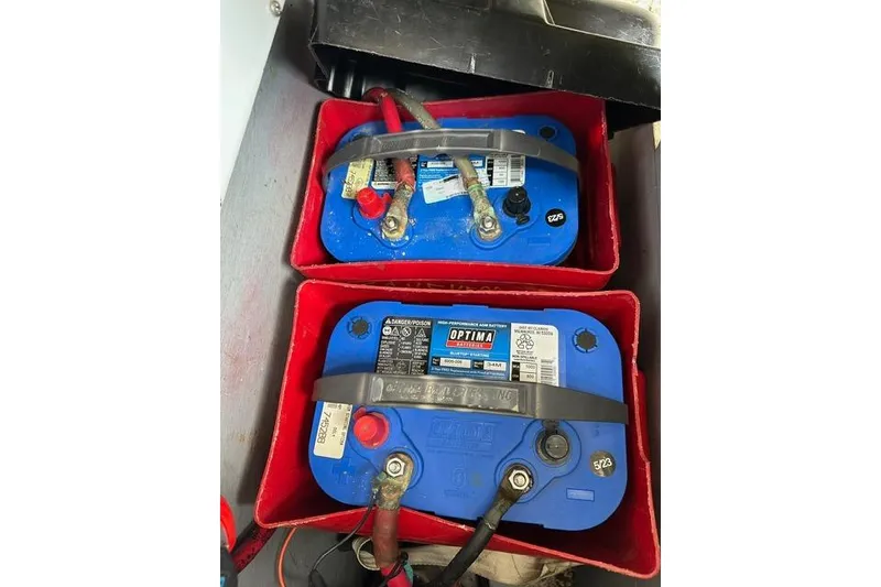 Slide: The Image of Optima marine batteries in a 1964 Hinckley Pilot 35 Sloop, secured in red cases. - 31