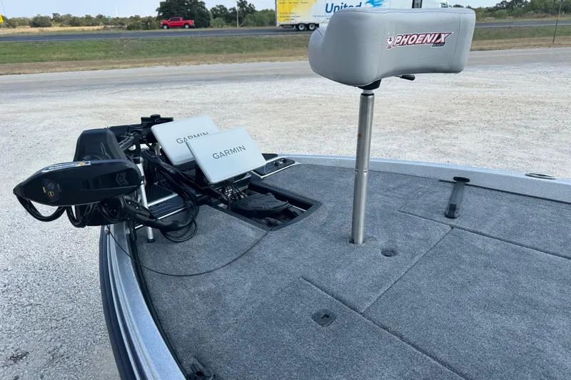 Slide: The Image of 2026 Phoenix 721 ZXL boat deck with Garmin electronics and trolling motor. - 5