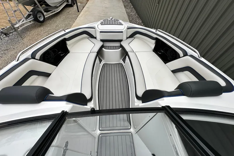 Slide: The Image of 2018 Yamaha Boats 242 Limited S E-Series interior with sleek seating and modern design. - 4