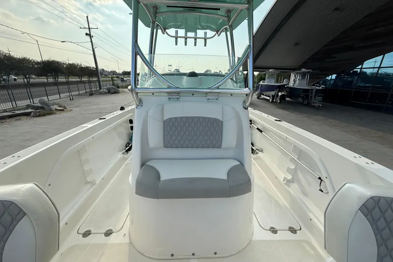 Slide: The Image of 2020 Twin Vee 240 GFX CC boat interior with seating and console. - 14
