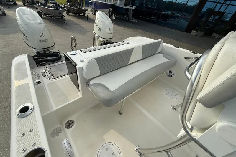 Slide: The Image of 2020 Twin Vee 240 GFX CC boat interior with Suzuki 140 engines. - 16