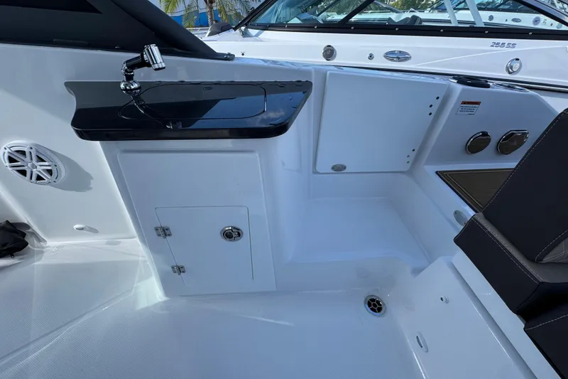 Slide: The Image of Interior of 2026 Monterey Elite 27 OB boat with sleek seating and modern fixtures. - 5