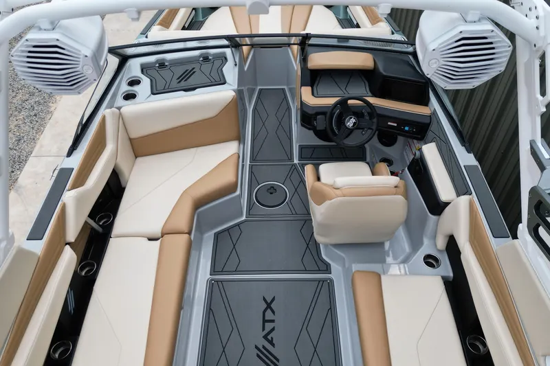 Slide: The Image of 2026 ATX Surf Boats 22 Type-S interior with tan and gray seating, modern design. - 12