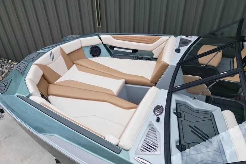 Slide: The Image of 2026 ATX Surf Boats 22 Type-S interior with tan and white seating, modern design. - 8