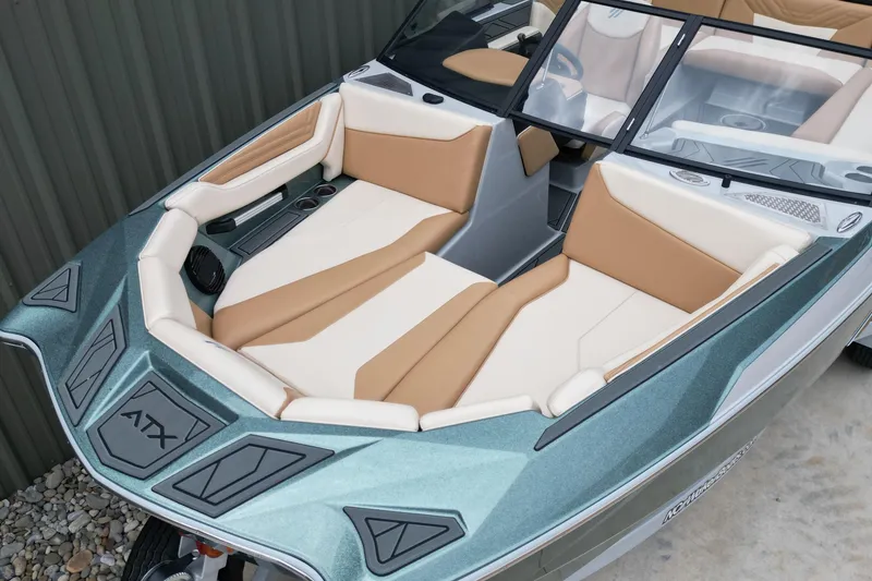 Slide: The Image of 2026 ATX Surf Boats 22 Type-S interior with tan and white seating, sleek design. - 9