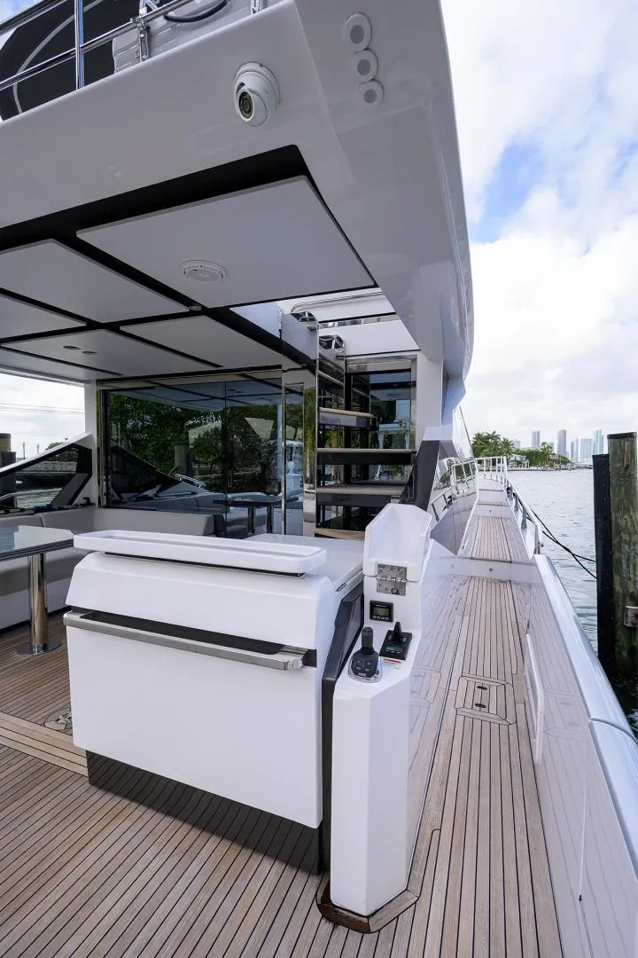 Slide: The Image of 2019 Azimut S7 yacht deck with modern design and waterfront view. - 13