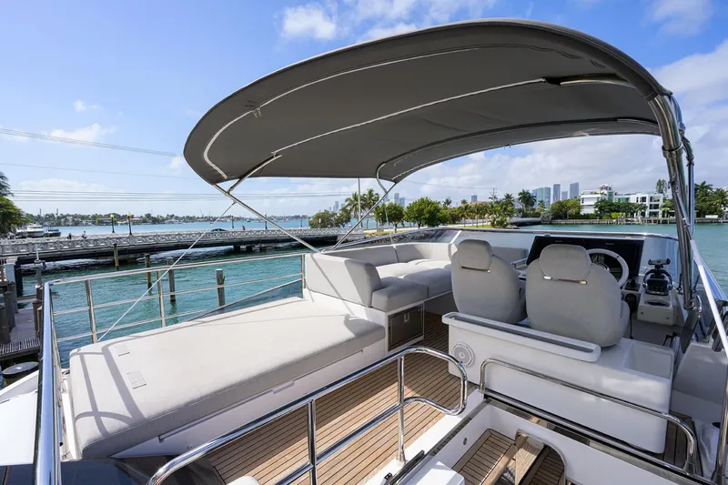 Slide: The Image of 2019 Azimut S7 yacht with spacious deck and scenic waterfront view. - 19