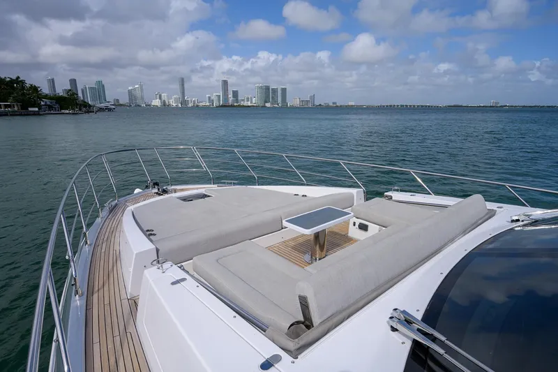 Slide: The Image of 2019 Azimut S7 yacht with city skyline in the background. - 24