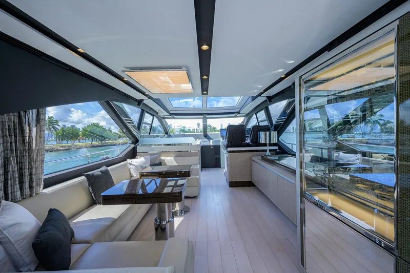 Slide: The Image of Luxurious interior of 2019 Azimut S7 yacht with panoramic windows and modern furnishings. - 30