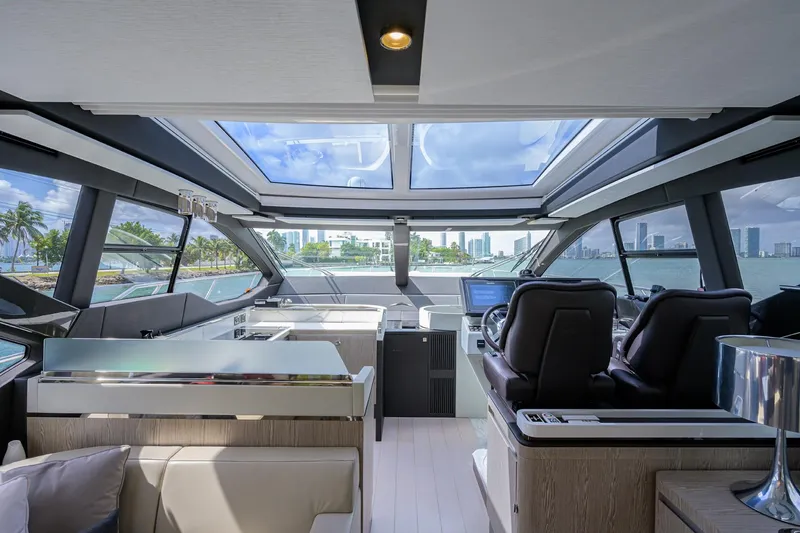 Slide: The Image of Interior of 2019 Azimut S7 yacht with panoramic windows and modern design. - 31