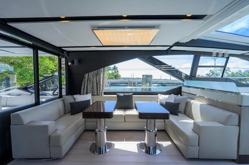 Slide: The Image of Luxurious interior of 2019 Azimut S7 yacht with modern seating and large windows. - 32