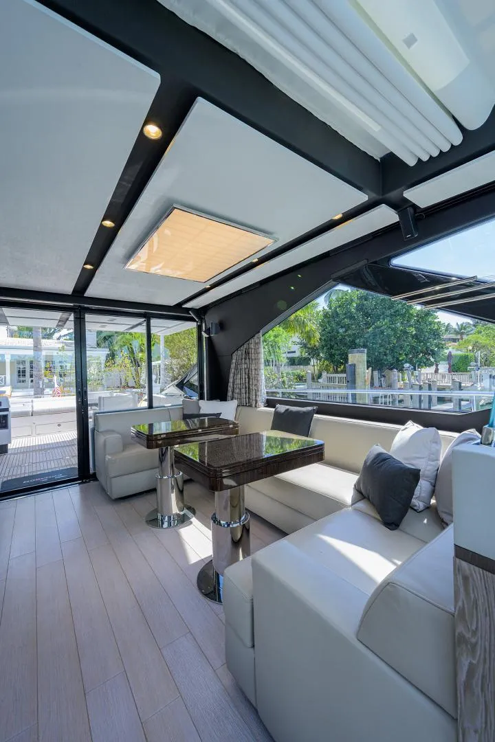 Slide: The Image of Luxurious interior of a 2019 Azimut S7 yacht with modern seating and large windows. - 33