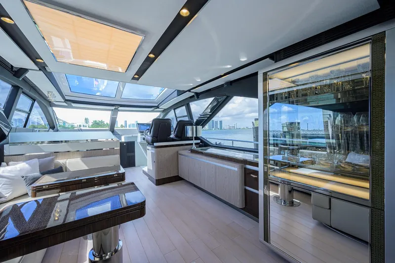 Slide: The Image of Luxurious interior of 2019 Azimut S7 yacht with panoramic windows and modern furnishings. - 36