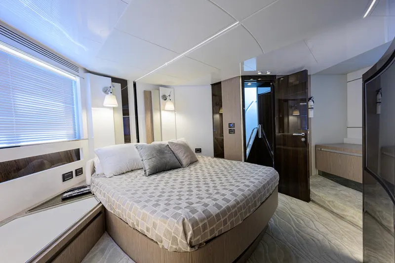 Slide: The Image of Luxurious bedroom interior of 2019 Azimut S7 yacht with modern design and cozy lighting. - 39