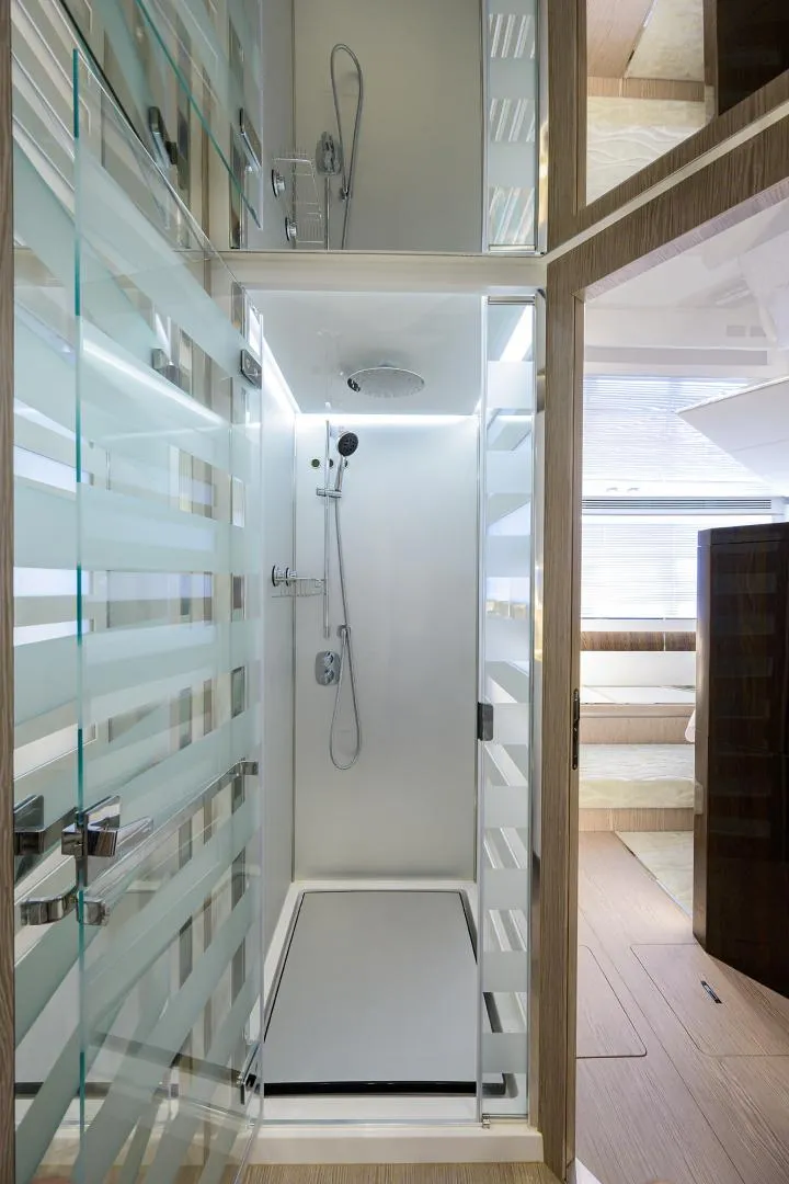 Slide: The Image of Modern shower area in 2019 Azimut S7 yacht with glass doors and sleek design. - 42