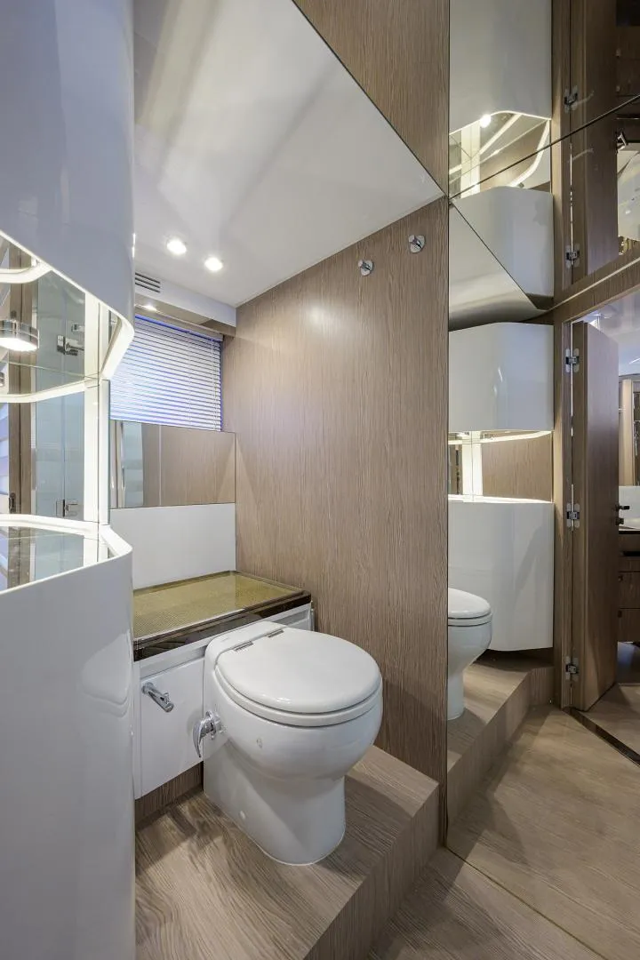 Slide: The Image of Modern bathroom in 2019 Azimut S7 yacht with sleek design and wooden accents. - 44