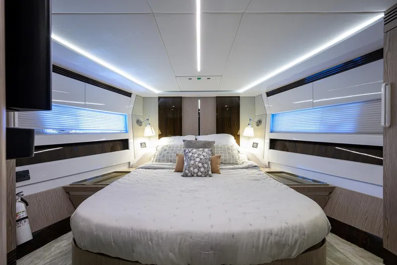 Slide: The Image of Luxurious bedroom interior of 2019 Azimut S7 yacht with modern lighting and elegant decor. - 45