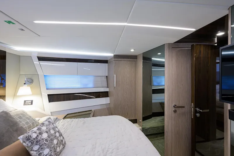 Slide: The Image of Luxurious bedroom interior of 2019 Azimut S7 yacht with modern design and ambient lighting. - 46