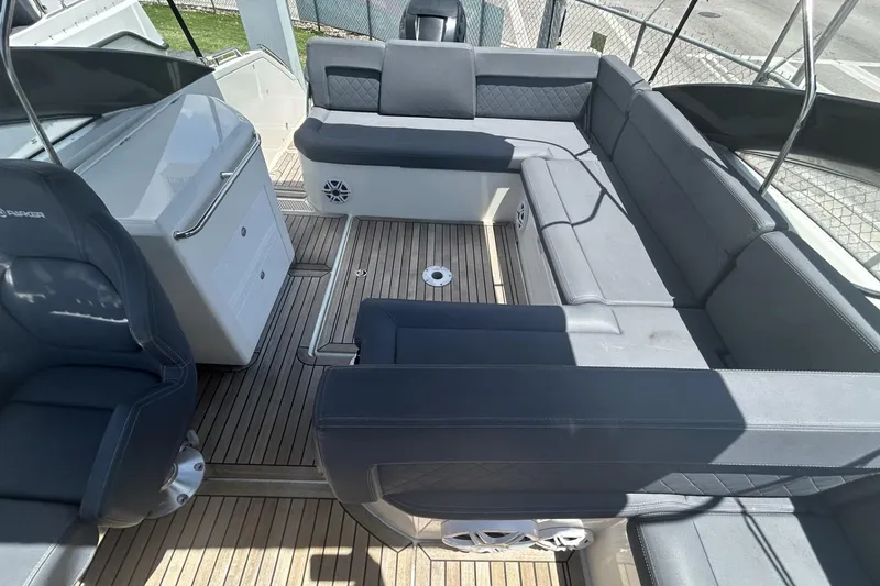 Slide: The Image of 2022 Parker Poland 850 Voyager boat interior with spacious seating and modern design. - 5