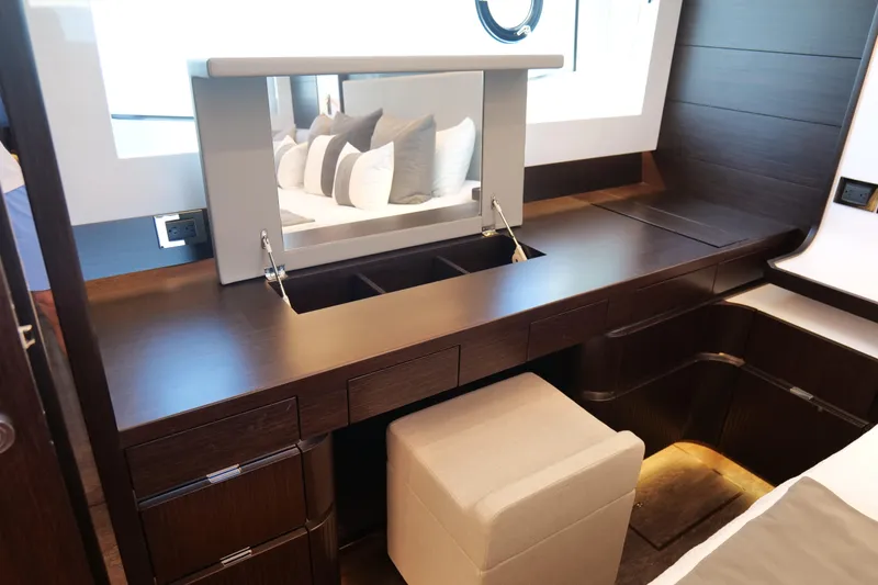 Slide: The Image of Luxurious Pearl 62 yacht interior with elegant vanity and seating, 2022 model. - 26