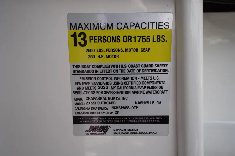Slide: The Image of 2022 Chaparral 23 SSi OB capacity label: 13 persons, 1765 lbs, 250 HP motor. - 17