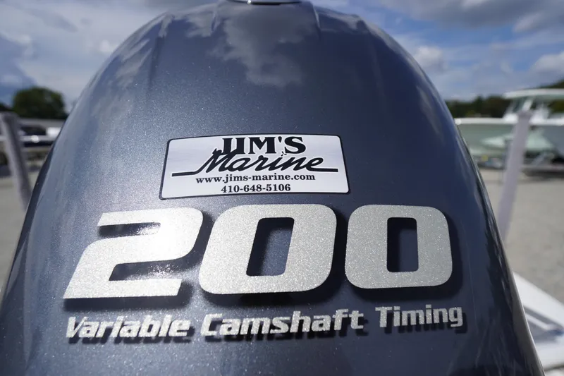 Slide: The Image of Close-up of a 2022 Chaparral 23 SSi OB engine with Jim's Marine sticker. - 44