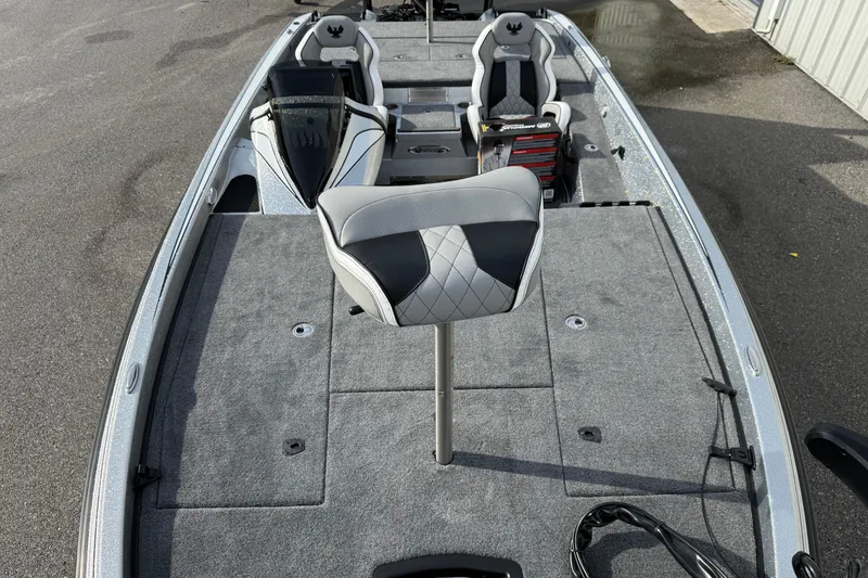 Slide: The Image of 2026 Phoenix 920 Elite X boat interior with seating and storage compartments. - 9