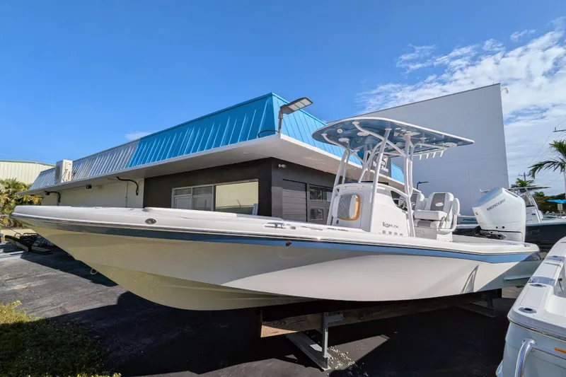 Slide: The Image of 2026 BlackJack 256 Coastal boat on display, featuring sleek design and modern features. - 2