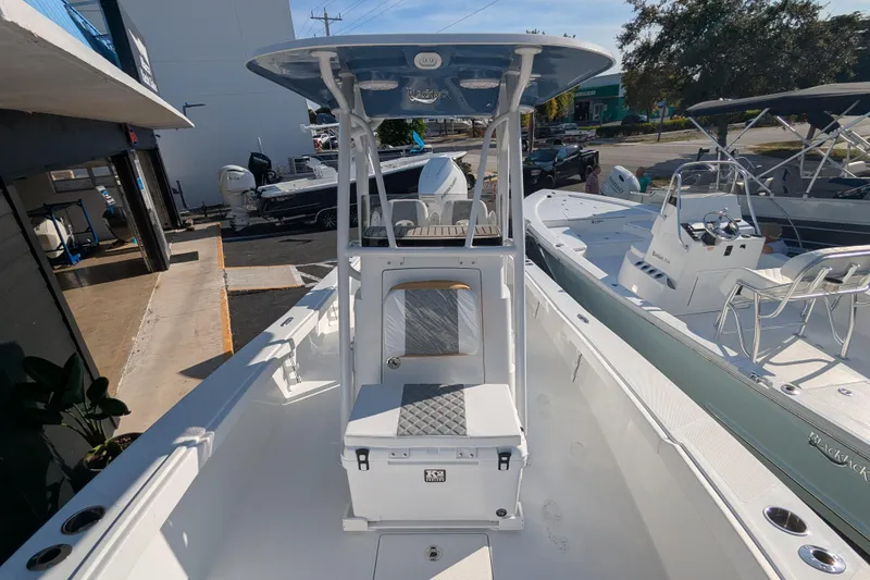 Slide: The Image of 2026 BlackJack 256 Coastal boat T-top with speakers and lights, viewed from below. - 7