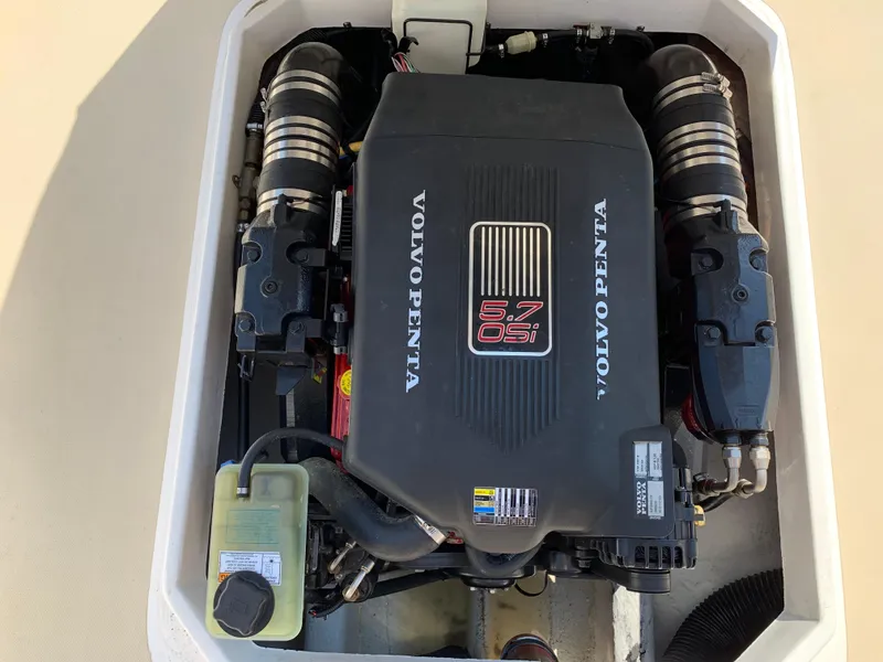 Slide: The Image of Volvo Penta engine in 2004 Hunt Yachts Surfhunter 25, showcasing mechanical components. - 22