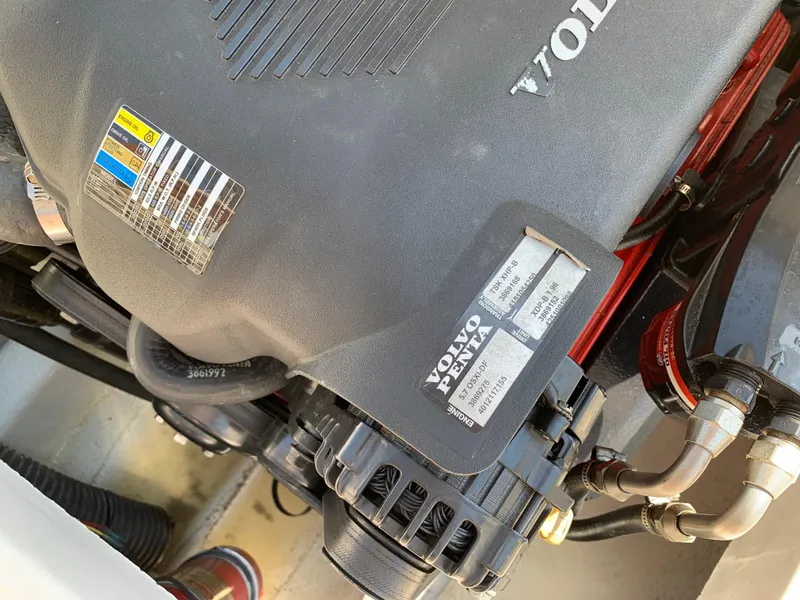 Slide: The Image of Volvo Penta engine in 2004 Hunt Yachts Surfhunter 25, showcasing detailed components and labels. - 24