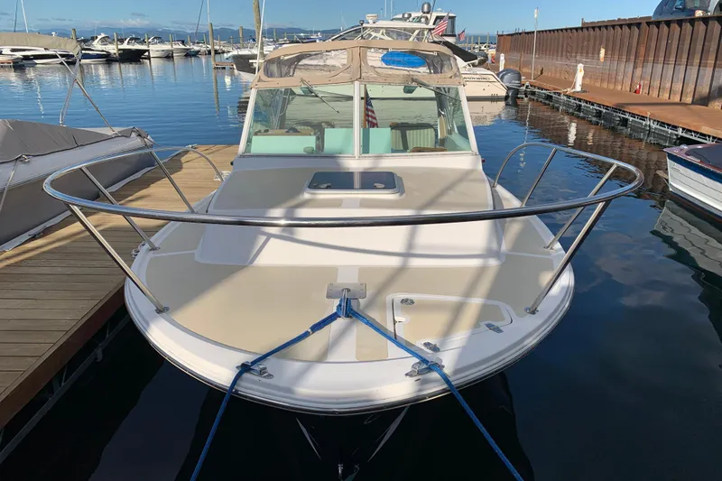 Slide: The Image of 2004 Hunt Yachts Surfhunter 25 docked at marina, front view. - 32