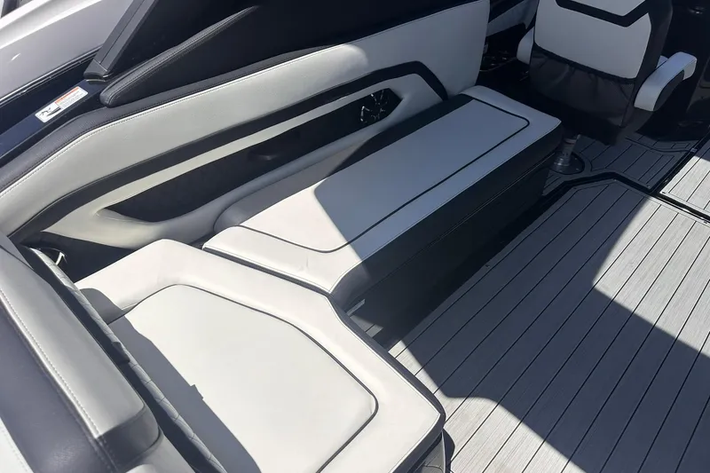 Slide: The Image of 2025 Yamaha Boats 275SD interior with sleek seating and modern design. - 19