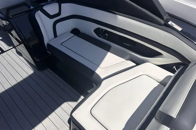 Slide: The Image of 2025 Yamaha Boats 275SD interior with sleek, modern seating and stylish design. - 20