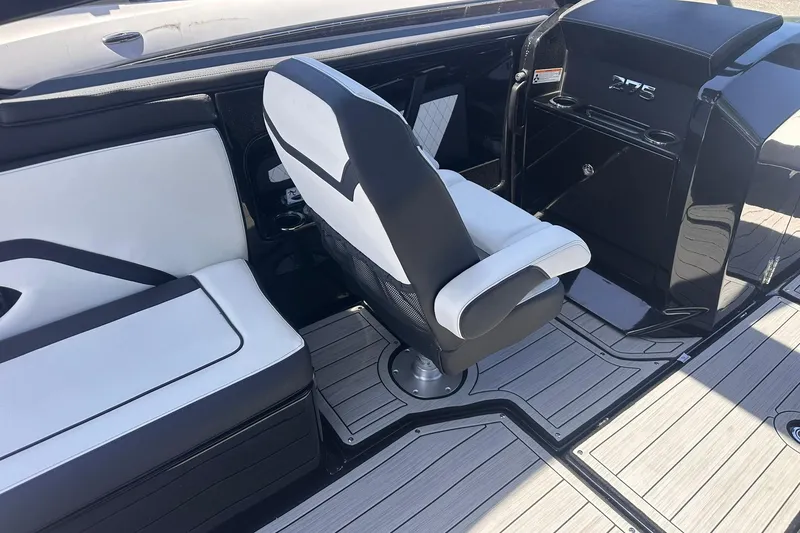 Slide: The Image of 2025 Yamaha Boats 275SD interior with sleek seating and modern design. - 23