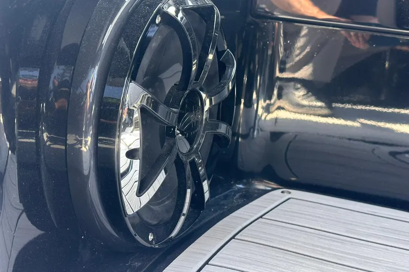 Slide: The Image of Close-up of a speaker on a 2025 Yamaha Boats 275SD, showcasing sleek design. - 24