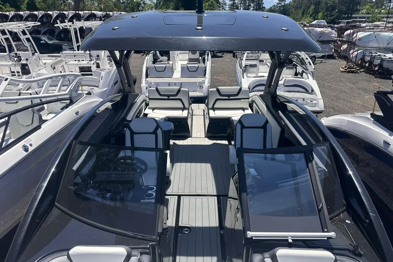 Slide: The Image of 2025 Yamaha Boats 275SD luxury interior with sleek seating and modern design. - 41