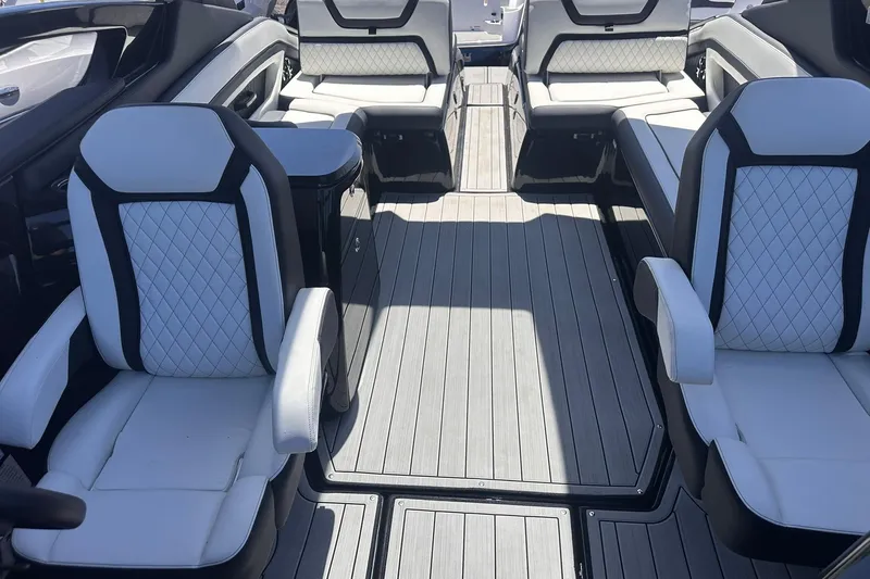 Slide: The Image of Luxurious interior of 2025 Yamaha Boats 275SD with stylish seating and sleek flooring. - 42