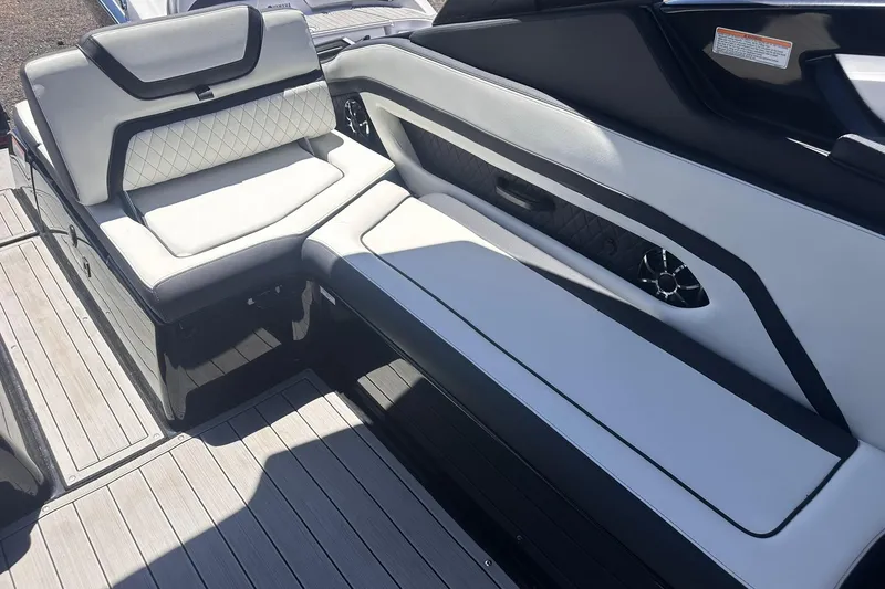 Slide: The Image of 2025 Yamaha Boats 275SD interior with luxurious seating and modern design. - 46