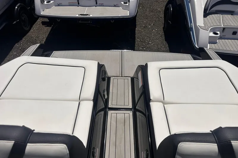 Slide: The Image of 2025 Yamaha Boats 275SD interior with sleek seating and modern design. - 48