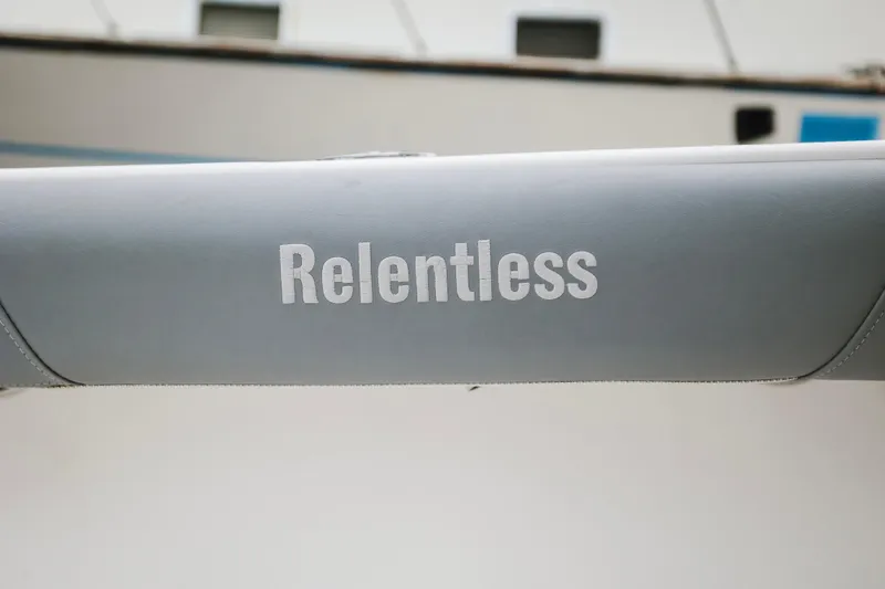 Slide: The Image of Gray boat seat with "Relentless" text, Everglades 350LX, 2008 model. - 10
