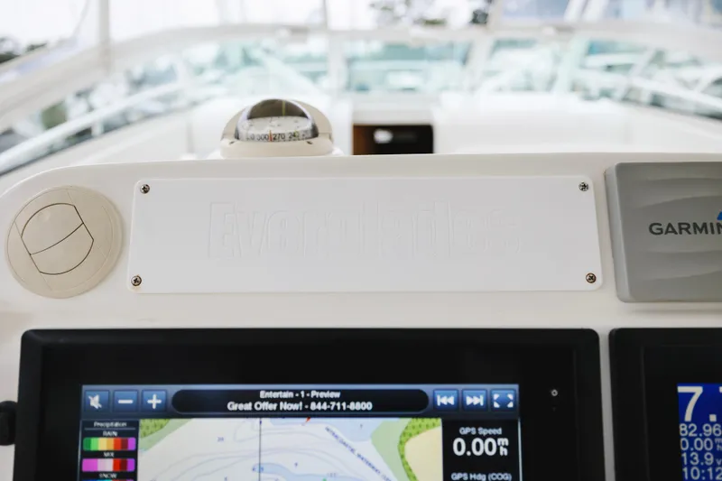 Slide: The Image of Dashboard of 2008 Everglades 350LX boat with Garmin navigation system. - 25