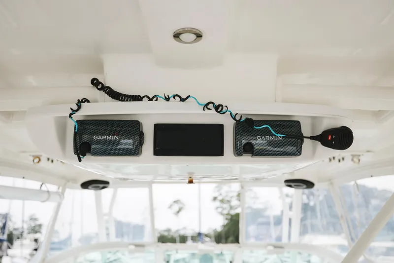 Slide: The Image of 2008 Everglades 350LX boat interior with Garmin electronics and microphone. - 28