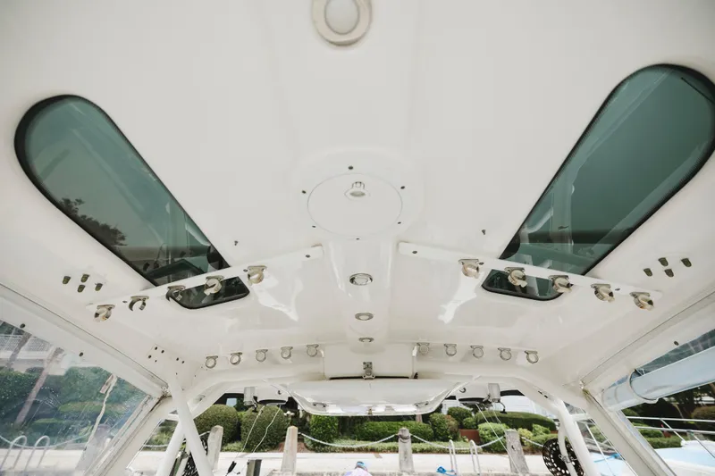Slide: The Image of Interior view of 2008 Everglades 350LX boat ceiling with skylights and fixtures. - 35