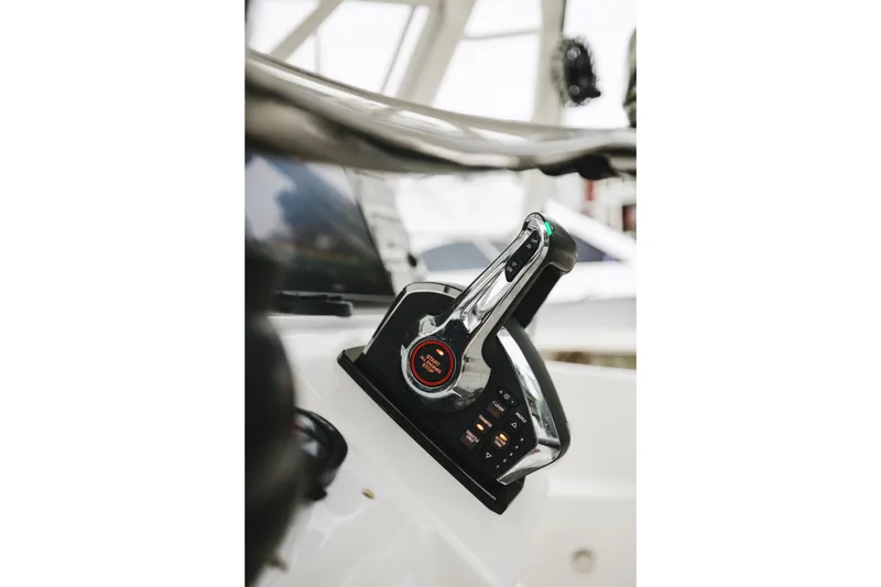 Slide: The Image of Close-up of 2008 Everglades 350LX boat throttle control in cockpit. - 36
