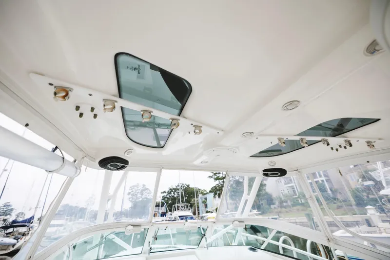 Slide: The Image of Interior view of 2008 Everglades 350LX boat, showcasing ceiling design and windows. - 37