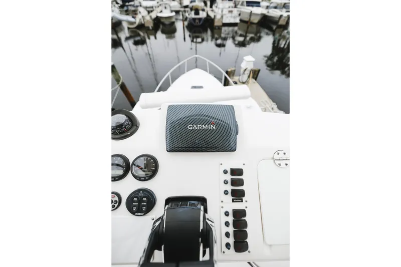 Slide: The Image of Control panel of a 2008 Everglades 350LX boat with Garmin navigation system. - 41