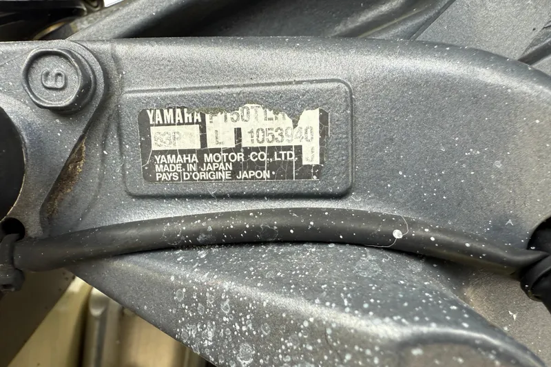 Slide: The Image of Close-up of a Yamaha motor label on a 2006 ShearWater Z2200 boat. - 45