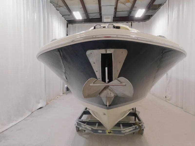 Slide: The Image of 2024 Chris-Craft Calypso 32 boat in indoor storage facility. - 6