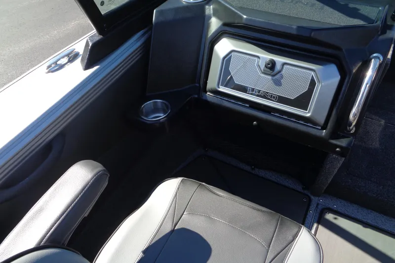 Slide: The Image of Interior of 2026 Lund 1975 Tyee boat, featuring seating and storage compartment. - 17